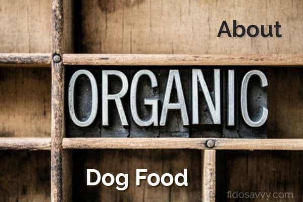 Divided wooden tray with words 'About Organic Dog Food' arranged inside Divided wooden tray with words 'About Organic Dog Food' arranged inside