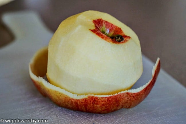 partially peeled apple partially peeled apple