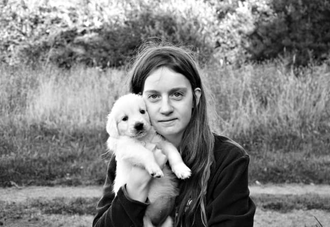 Puppy with owner who is looking sad Puppy with owner who is looking sad