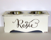 Rustic, wooden elevated dog feeder